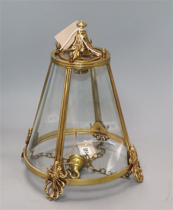 A gilt brass and four glass hall lantern